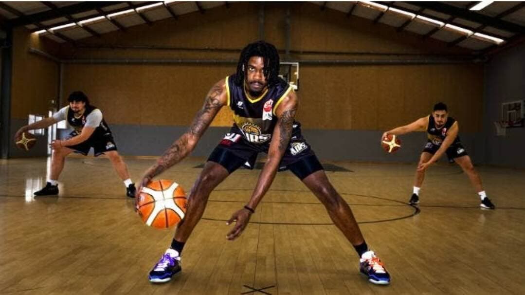 Armon Fletcher leading a ball-handling drill
